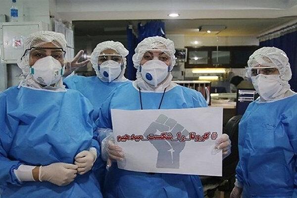 عکس ، کادر درمان با لباس های محافظتی در بازار علوی اهواز عکس ، کادر درمان با لباس های محافظتی در بازار علوی اهواز